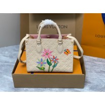 LV x YK OnTheGo PM Monogram Empreinte Leather Bag M21732