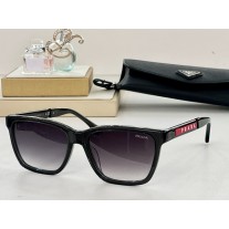 Prada Linea Rossa PS 04XS Sunglasses Polished Black Frame Gradient Lenses
