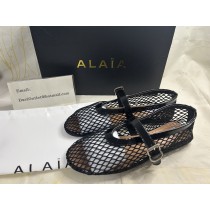 ALAÏA Ballet Flats In Fishnet Black