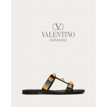 Knock off valentino canada store Flat Roman Stud Calfskin Slide Sandal for Woman in Black