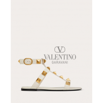 Shop fake valentino yorkdale toronto Roman Stud Flat Calfskin Sandal for Woman in Light Ivory