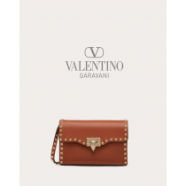 reps valentino canada locations Small Rockstud Grainy Calfskin Crossbody Bag for Woman in Saddle Brown