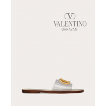 cheap knokcoff valentino canada outlet Vlogo Signature Transparent Polymer Slide Sandal for Woman in Saddle Brown/transparent
